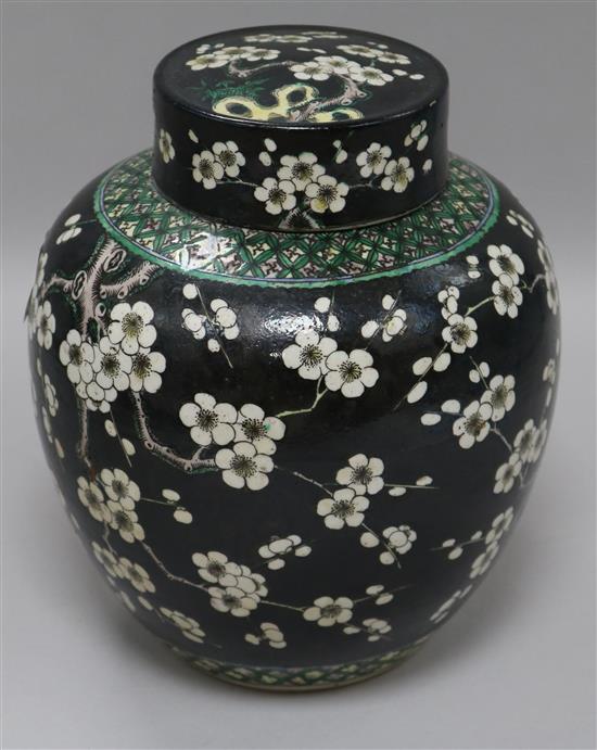 A Chinese famille noire jar 22cm